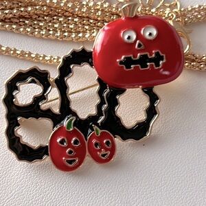 BETSEY JOHNSON ALLOY AND ENAMAL ORANGE AND BLACK BOO PUMPKIN NECKLACE & BROOCH